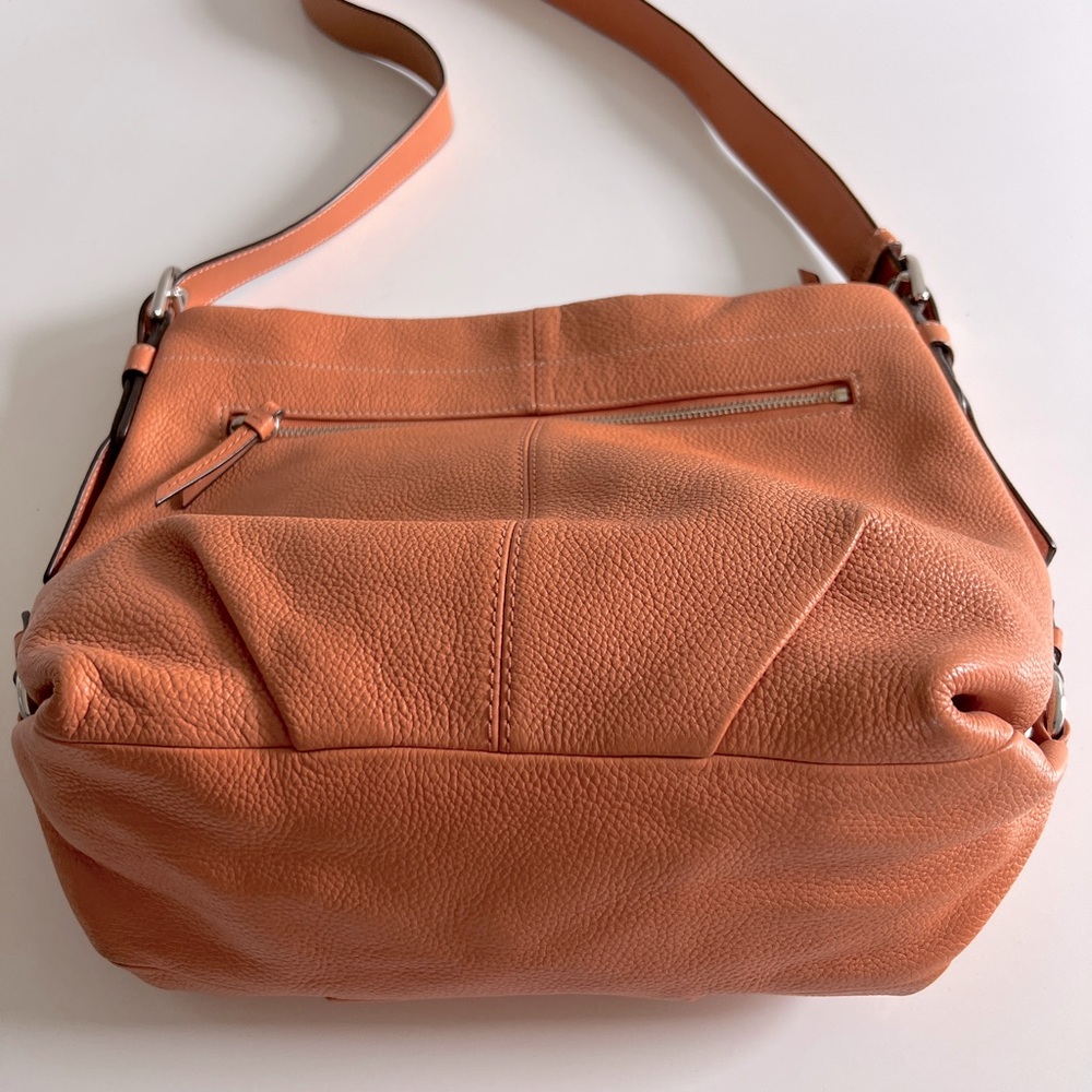 Coach leather shoulder bag light rust .
